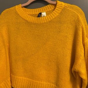 yellow sweater